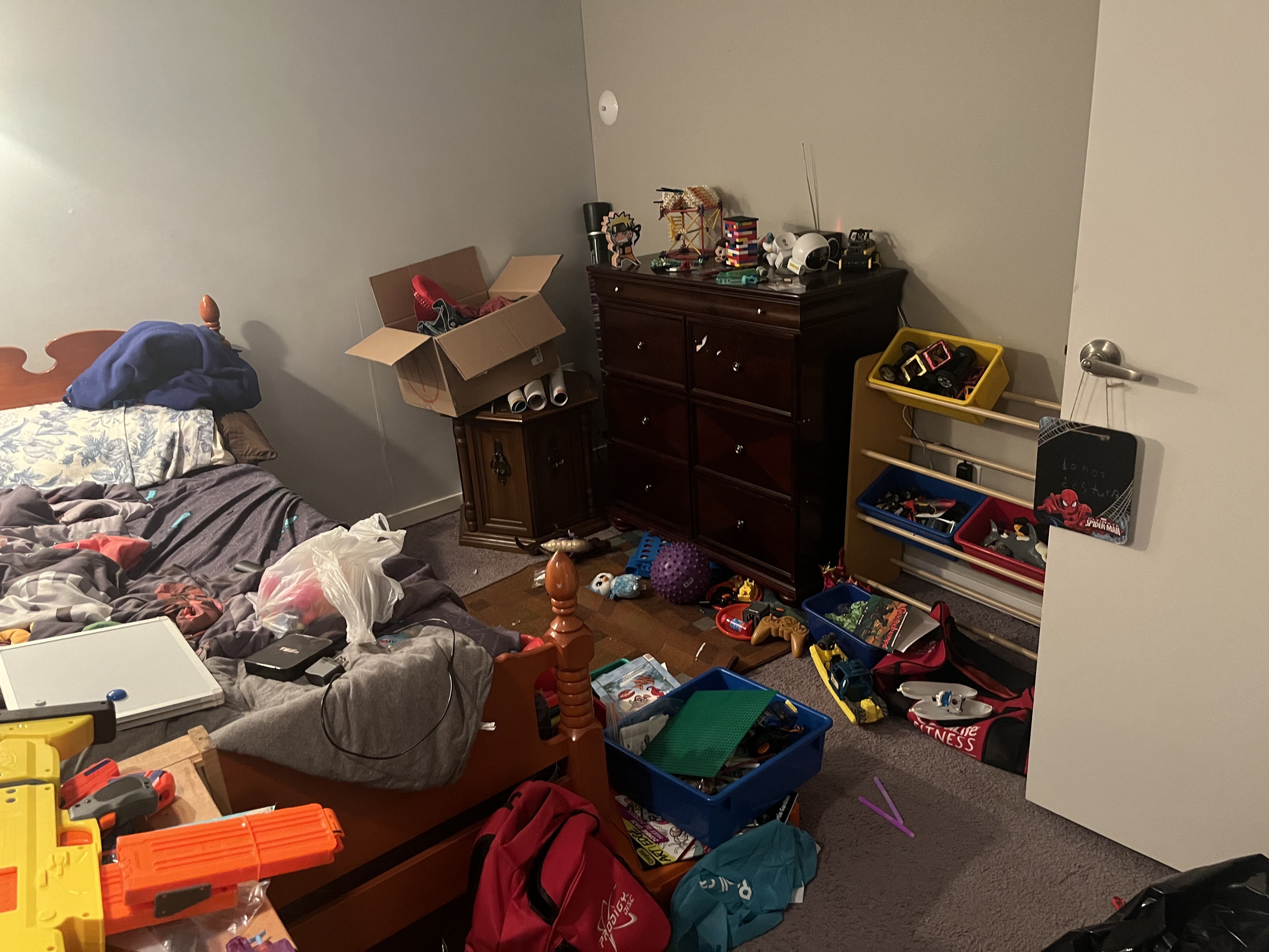 Kids bedroom before organizing from a second angle